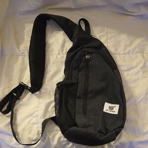 Black Sling Bag by [Brand]
